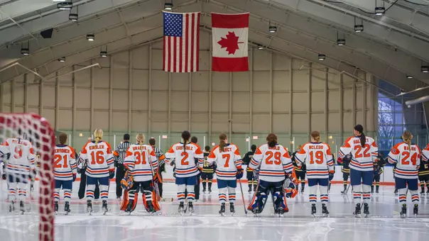 Ice Hockey team standing on Blue Line