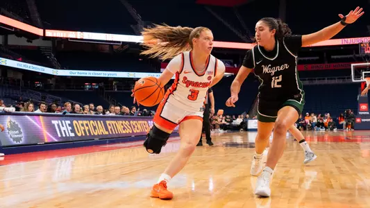 Liv Schmitt driving through to the paint