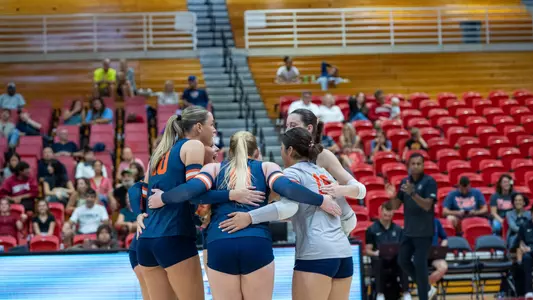 Volleyball Team Huddle vs. Cornell