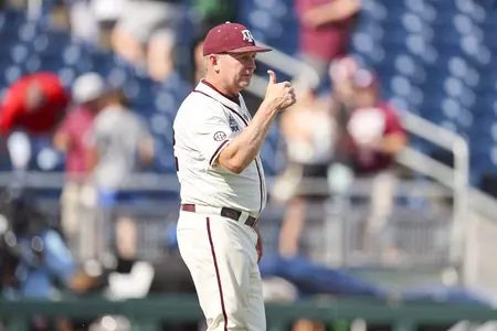 OMAHA, NE - June 19, 2022 - Head Coach Jim Schlossnagle of the Texas A&M Aggies during the NCAA Baseball College World Series game between the Texas Longhorns and the Texas A&M Aggies at Charles Schwab Field in Omaha, NE. Photo By Craig Bisacre