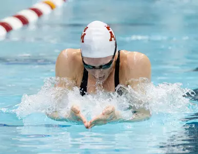 Olympian Larson Sets NCAA, American Record