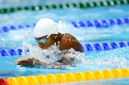 Former A&M NCAA Champ Atkinson sets world record, wins world title