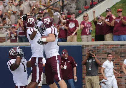Aggies Roll Past SMU, 48-3