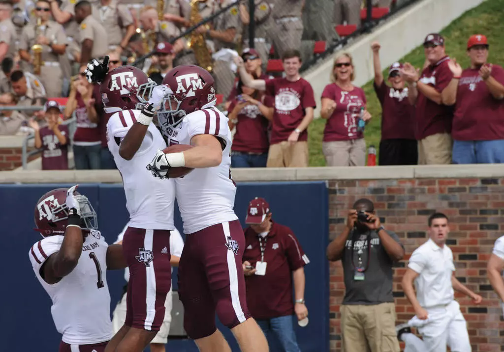 Aggies Roll Past SMU, 48-3