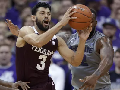 Men's Basketball Battles But Falls to K-State, 71-64