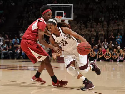 Jones' Triple-Double Leads Aggies Past Arkansas, 77-54