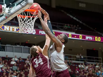 Men's Basketball Powers Past Montana in NIT First Round