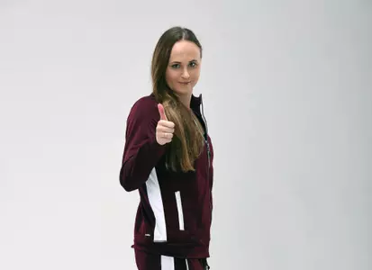 Sarah Gibson in warmup jacket