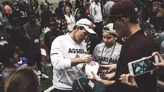 Coach Fisher Signing Autographs