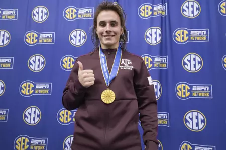 Kurtis Mathew with gold medal for the 1-meter
