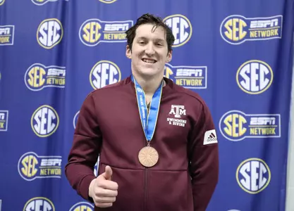 Mark Theall with bronze medal for the 200 free at the SEC Championships
