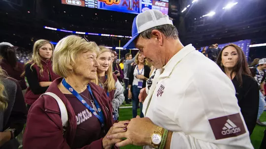 Jimbo and Gloria Fisher at Texas Bowl