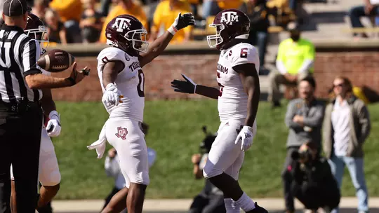 Ainias Smith and Devon Achane