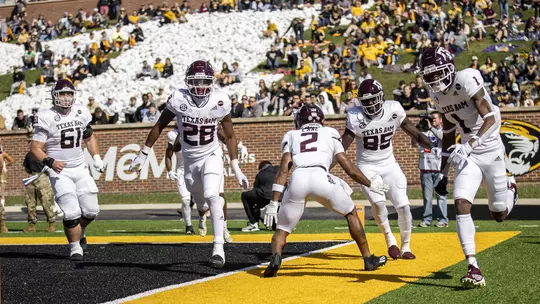 Isaiah Spiller and touchdown celebration