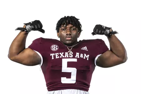 COLLEGE STATION, TX - July 28, 2021 - Defensive lineman Shemar Turner #5 of the Texas A&M Aggies during Texas A&M Aggies Football Photo Day in The Studio at Kyle Field in College Station, TX. Photo By Craig Bisacre/Texas A&M Athletics