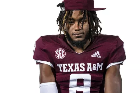 COLLEGE STATION, TX - July 28, 2021 - Defensive lineman Yulkeith Brown #8 of the Texas A&M Aggies during Texas A&M Aggies Football Photo Day in The Studio at Kyle Field in College Station, TX. Photo By Craig Bisacre/Texas A&M Athletics