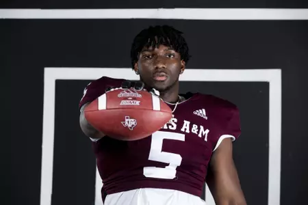 COLLEGE STATION, TX - July 28, 2021 -  Defensive lineman Shemar Turner #5 of the Texas A&M Aggies during Football Photo Day in College Station, TX. Photo By Olivia Treadwell/Texas A&M Athletics