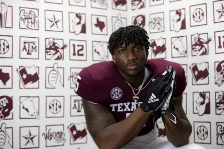 COLLEGE STATION, TX - July 28, 2021 - Defensive lineman Shemar Turner #5 of the Texas A&M Aggies during the Texas A&M Aggies Football Photo Day at the Studio in College Station, TX. Photo ByCraig Bisacre/Texas A&M Athletics