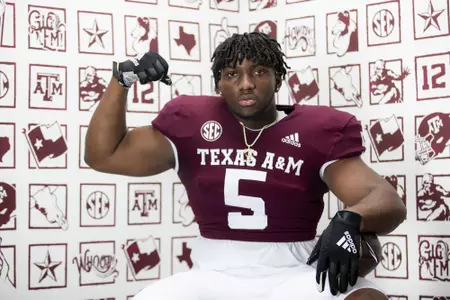 COLLEGE STATION, TX - July 28, 2021 - Defensive lineman Shemar Turner #5 of the Texas A&M Aggies during the Texas A&M Aggies Football Photo Day at the Studio in College Station, TX. Photo ByCraig Bisacre/Texas A&M Athletics