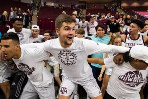 COLLEGE STATION, TX - November 10, 2021 - Forward Everett Vaughn #12 of the Texas A&M Aggies and student sections fans during the game between the North Florida Ospreys and the Texas A&M Aggies at Reed Arena in College Station, TX. Photo By Olivia Treadwell/Texas A&M Athletics