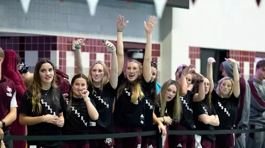 Aggie Women's swim and Dive cheerng