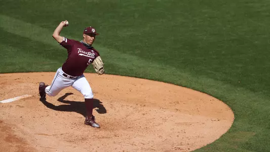 Mason Ornelas fires a pitch from the mound against Alabama