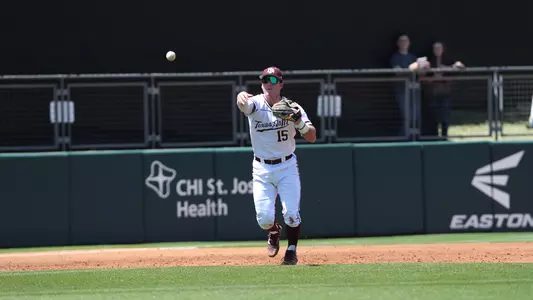 Bryce Blaum makes a throw across the infield from the hot corner