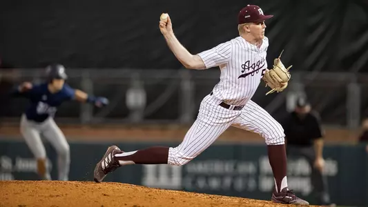 Alex Magers brings his side-arm delivery against Rice.