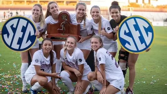 Texas A&M's Freshman Class poses with the 2020 SEC regular season trophy
