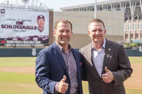 Coach Schlossnagle and Ross Bjork pose for a photo at Blue Bell Park.