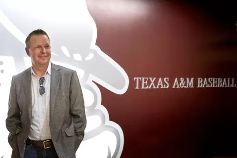 Coach Schlossnagle inside the baseball facility.