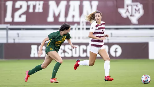 Taylor Pounds ranges in the midfield against Baylor