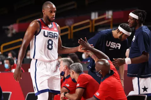 SAITAMA, JAPAN - JULY 31: Khris Middleton #8 of Team United States gets a high-five as he makes his way to the bench during the second half of a Men's Basketball Preliminary Round Group A game against Czech Republic on day eight of the Tokyo 2020 Olympic Games at Saitama Super Arena on July 31, 2021 in Saitama, Japan. (Photo by Gregory Shamus/Getty Images)