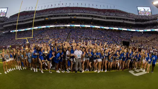 group photo of AD Honor Roll recipients at the Kent State game