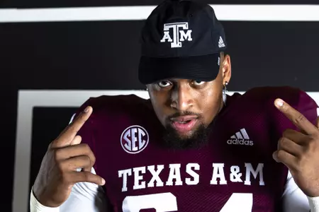 COLLEGE STATION, TX - July 27, 2021 - Offensive lineman Layden Robinson #64 of the Texas A&M Aggies during Texas A&M Aggies Football photo day in College Station, TX. Photo By Craig Bisacre/Texas A&M Athletics