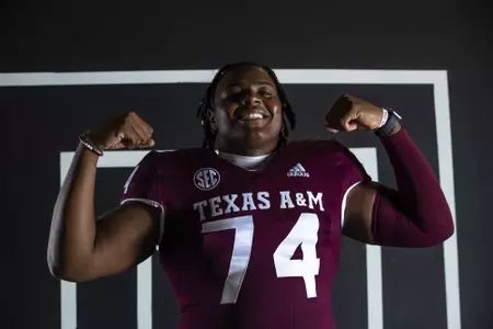 COLLEGE STATION, TX - July 27, 2021 - Offensive lineman Aki Ogunbiyi #74 of the Texas A&M Aggies during Texas A&M Aggies Football photo day in College Station, TX. Photo By Craig Bisacre/Texas A&M Athletics