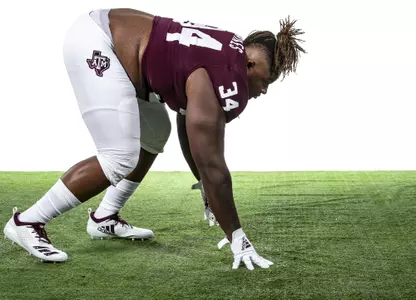 COLLEGE STATION, TX - July 27, 2021 - Defensive lineman Isaiah Raikes #34 of the Texas A&M Aggies during Texas A&M Aggies Football photo day in College Station, TX. Photo By Craig Bisacre/Texas A&M Athletics/Texas A&M Athletics