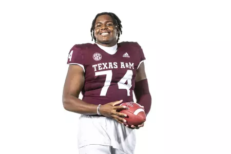 COLLEGE STATION, TX - July 27, 2021 - Offensive lineman Aki Ogunbiyi #74 of the Texas A&M Aggies during Texas A&M Aggies Football photo day in College Station, TX. Photo By Craig Bisacre/Texas A&M Athletics/Texas A&M Athletics