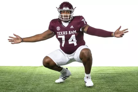 COLLEGE STATION, TX - July 27, 2021 - Offensive lineman Aki Ogunbiyi #74 of the Texas A&M Aggies during Texas A&M Aggies Football photo day in College Station, TX. Photo By Craig Bisacre/Texas A&M Athletics/Texas A&M Athletics