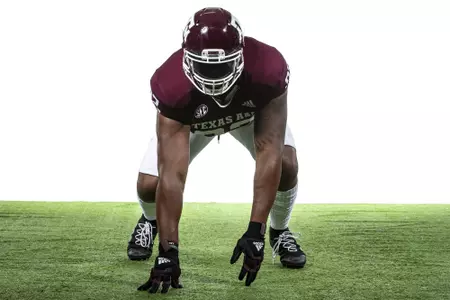 COLLEGE STATION, TX - July 27, 2021 - Defensive lineman Jayden Peevy #92 of the Texas A&M Aggies during Texas A&M Aggies Football photo day in College Station, TX. Photo By Craig Bisacre/Texas A&M Athletics/Texas A&M Athletics
