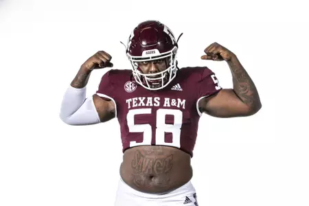 COLLEGE STATION, TX - July 28, 2021 - Offensive lineman Jahmir Johnson #58 of the Texas A&M Aggies during Texas A&M Aggies Football Photo Day in The Studio at Kyle Field in College Station, TX. Photo By Craig Bisacre/Texas A&M Athletics