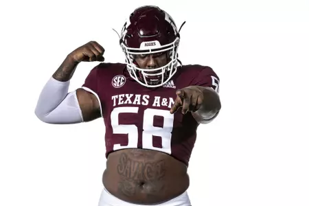 COLLEGE STATION, TX - July 28, 2021 - Offensive lineman Jahmir Johnson #58 of the Texas A&M Aggies during Texas A&M Aggies Football Photo Day in The Studio at Kyle Field in College Station, TX. Photo By Craig Bisacre/Texas A&M Athletics