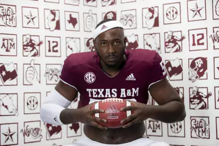 COLLEGE STATION, TX - July 28, 2021 - Offensive lineman Jahmir Johnson #58 of the Texas A&M Aggies during the Texas A&M Aggies Football Photo Day at the Studio in College Station, TX. Photo ByCraig Bisacre/Texas A&M Athletics