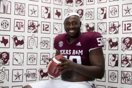 COLLEGE STATION, TX - July 28, 2021 - Offensive lineman Jahmir Johnson #58 of the Texas A&M Aggies during the Texas A&M Aggies Football Photo Day at the Studio in College Station, TX. Photo ByCraig Bisacre/Texas A&M Athletics
