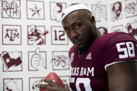 COLLEGE STATION, TX - July 28, 2021 - Offensive lineman Jahmir Johnson #58 of the Texas A&M Aggies during the Texas A&M Aggies Football Photo Day at the Studio in College Station, TX. Photo ByCraig Bisacre/Texas A&M Athletics