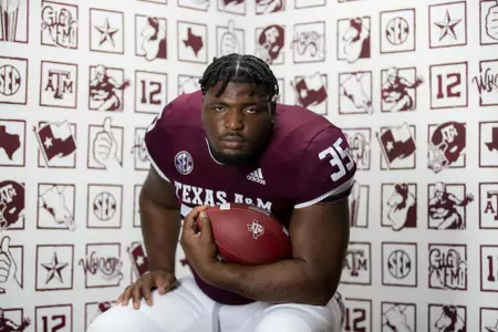 COLLEGE STATION, TX - July 28, 2021 - Defensive lineman McKinnley Jackson #35 of the Texas A&M Aggies during the Texas A&M Aggies Football Photo Day at the Studio in College Station, TX. Photo ByCraig Bisacre/Texas A&M Athletics