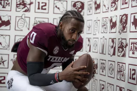 COLLEGE STATION, TX - July 28, 2021 - Wide receiver Ainias Smith #0 of the Texas A&M Aggies during the Texas A&M Aggies Football Photo Day at the Studio in College Station, TX. Photo ByCraig Bisacre/Texas A&M Athletics