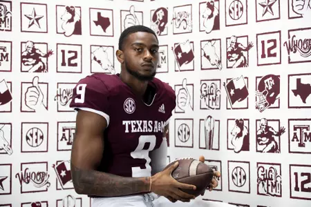 COLLEGE STATION, TX - July 29, 2021 - Wide receiver Hezekiah Jones #9 of the Texas A&M Aggies during Texas A&M Aggies Football Photo Day in The Studio at Kyle Field in College Station, TX. Photo By Texas A&M Athletics/Texas A&M Athletics