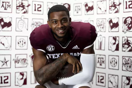 COLLEGE STATION, TX - July 29, 2021 - Wide receiver Hezekiah Jones #9 of the Texas A&M Aggies during Texas A&M Aggies Football Photo Day in The Studio at Kyle Field in College Station, TX. Photo By Texas A&M Athletics/Texas A&M Athletics