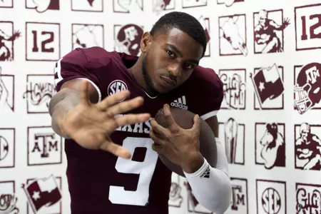 COLLEGE STATION, TX - July 29, 2021 - Wide receiver Hezekiah Jones #9 of the Texas A&M Aggies during Texas A&M Aggies Football Photo Day in The Studio at Kyle Field in College Station, TX. Photo By Texas A&M Athletics/Texas A&M Athletics